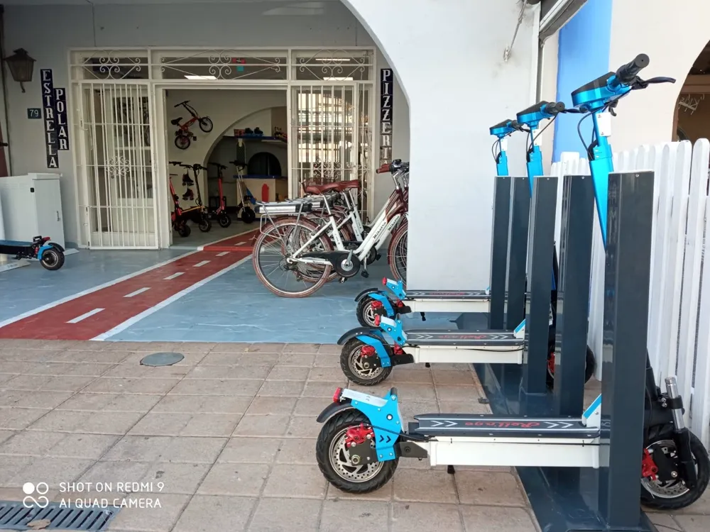 CityDock network docking station with e-scooters parked on a sidewalk