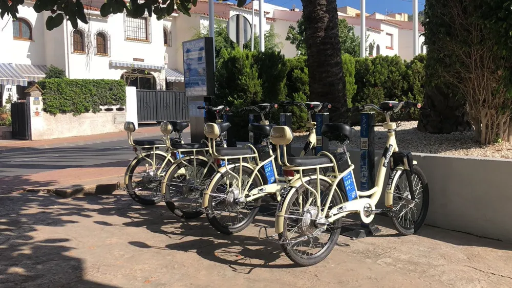 CityDock network e-scooters lined up at a docking station