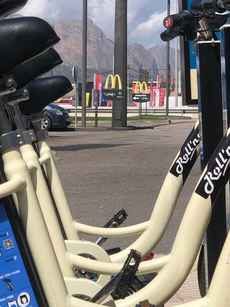 CityDock network e-scooters docked in a row